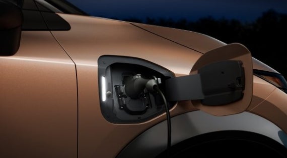Close-up image of charging cable plugged in | Mentor Nissan in Mentor OH