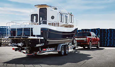 2022 Nissan TITAN Truck towing boat | Mentor Nissan in Mentor OH