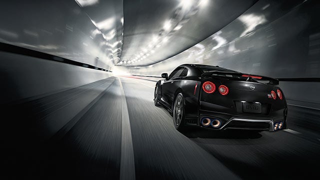 2023 Nissan GT-R seen from behind driving through a tunnel | Mentor Nissan in Mentor OH